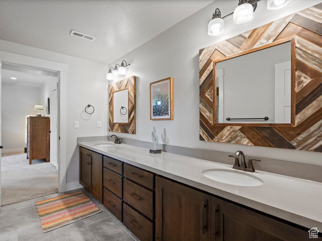 Full bathroom with double vanity