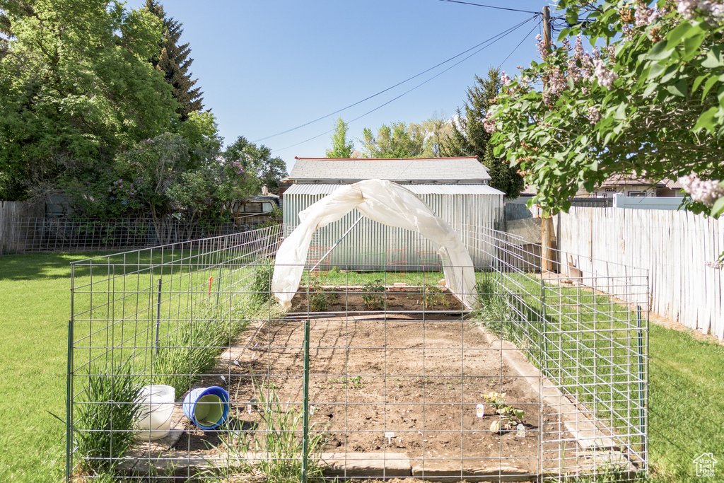 View of yard featuring a garden