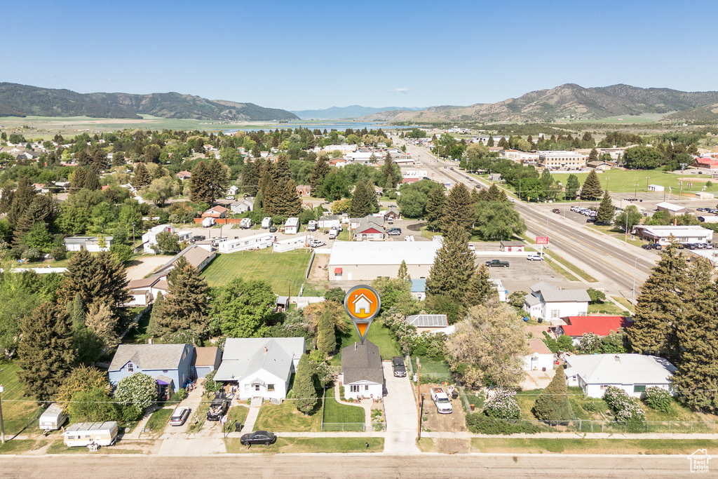 Aerial view of residential area with a mountainous background