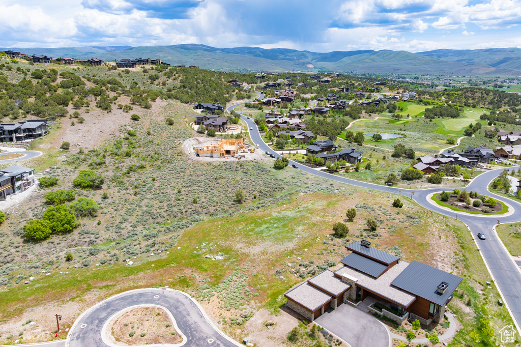Aerial view of residential area with a water and mountain view