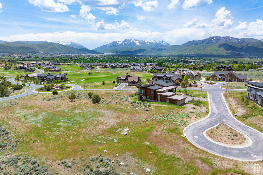 Mountain view featuring nearby suburban area and a local golf course