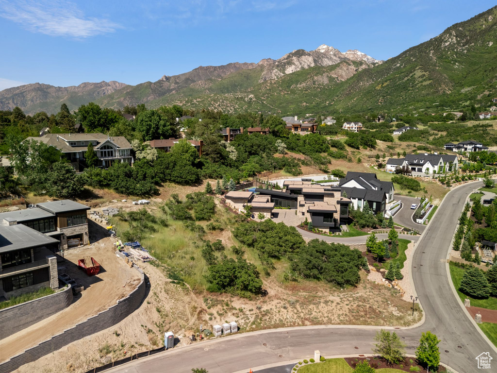 View of property location with a mountainous background and nearby suburban area