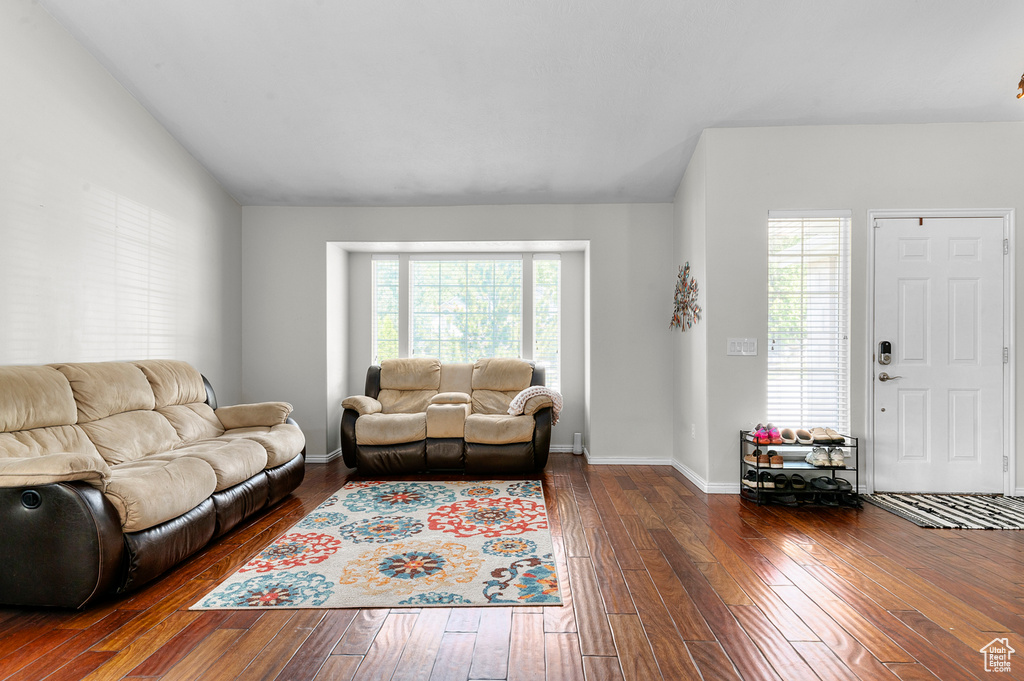 Living area with wood-type flooring and baseboards