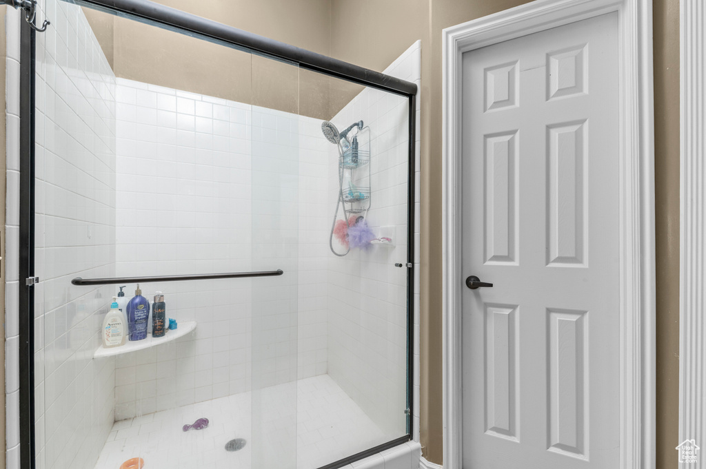 Full bath featuring a stall shower