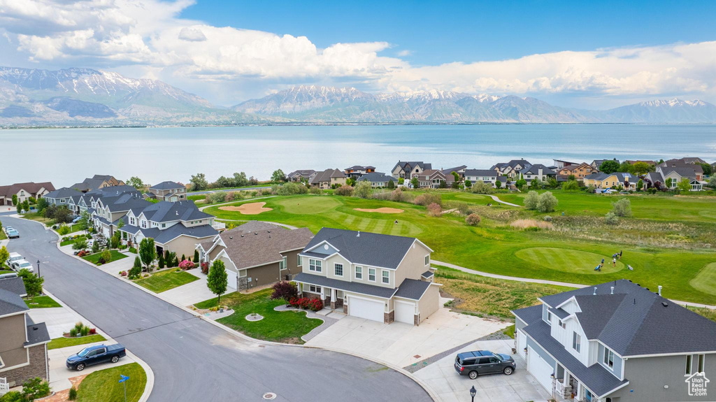 Aerial view of residential area with a water and mountain view