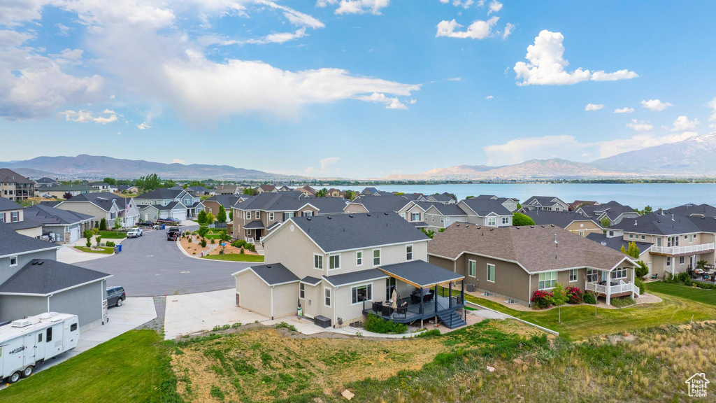 Aerial view of residential area with a water and mountain view