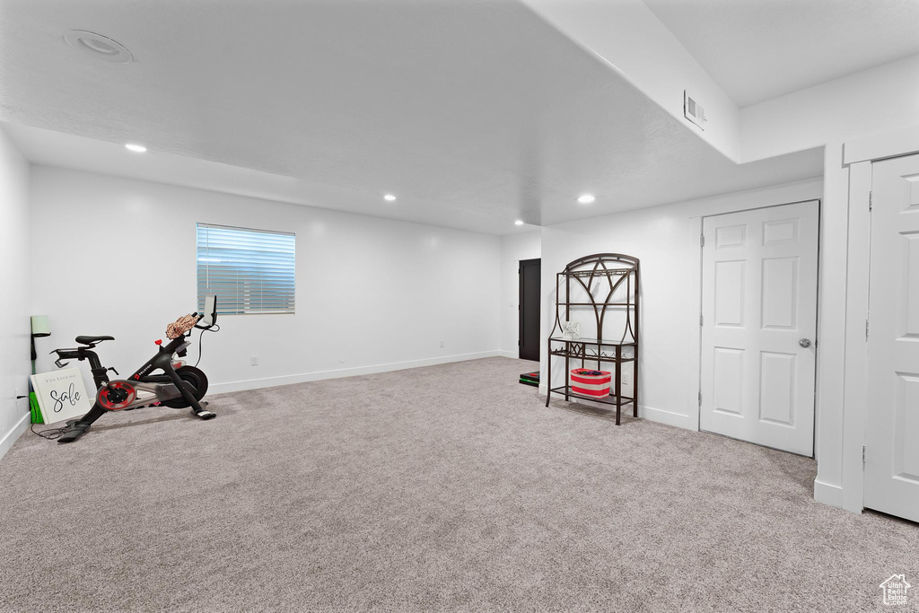 Workout room with carpet floors, recessed lighting, and baseboards