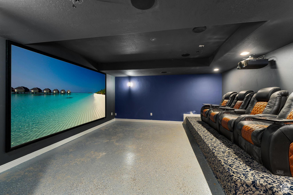 Cinema room featuring baseboards