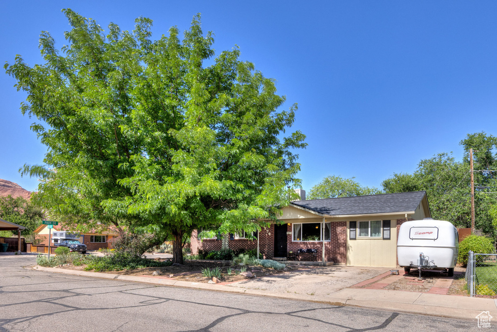 View of front of property featuring brick siding
