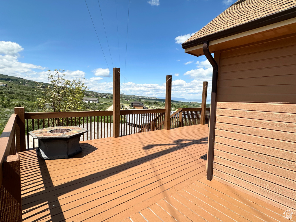 Wooden deck with a fire pit
