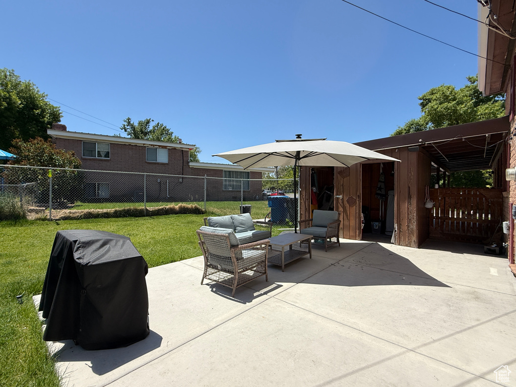 View of patio with an outdoor living space