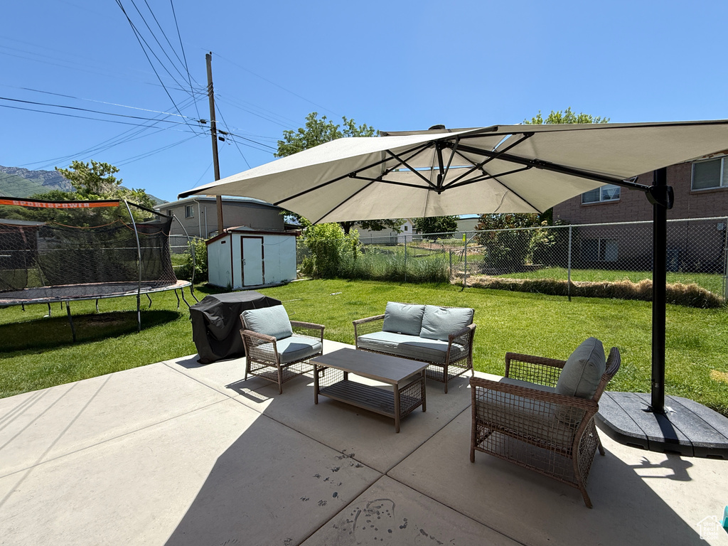 View of patio / terrace featuring a trampoline and an outdoor living space