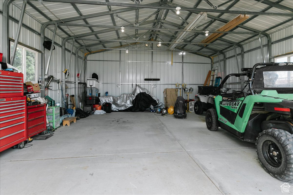 Garage featuring metal wall