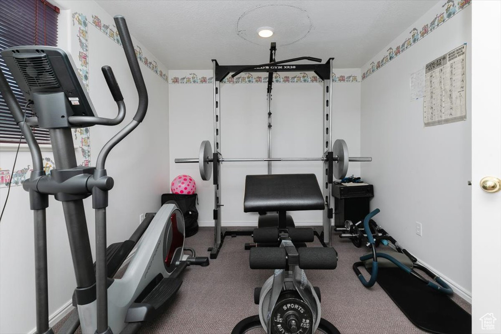 Workout room with baseboards