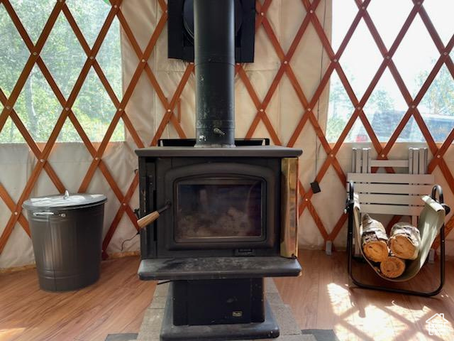 Detailed view of a wood stove and wood finished floors