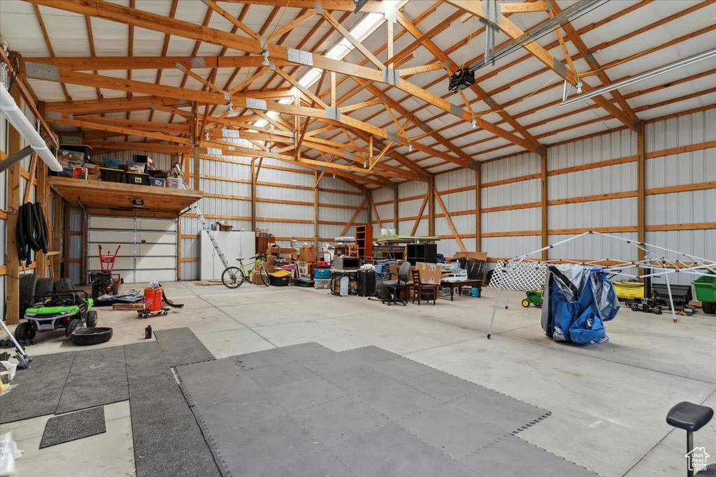 Garage with metal wall and a garage door opener