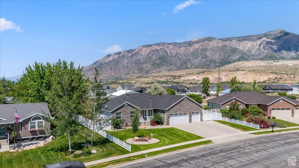 View of mountain backdrop with nearby suburban area