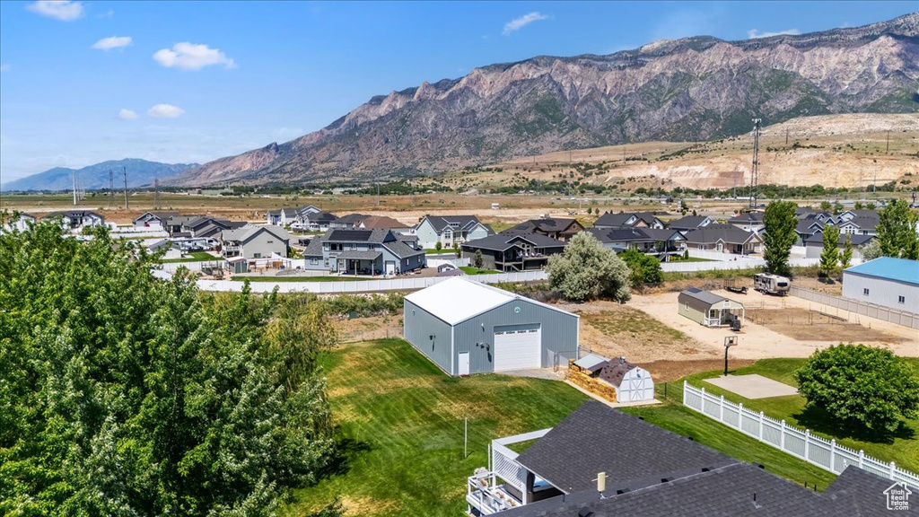 View of mountain background featuring nearby suburban area