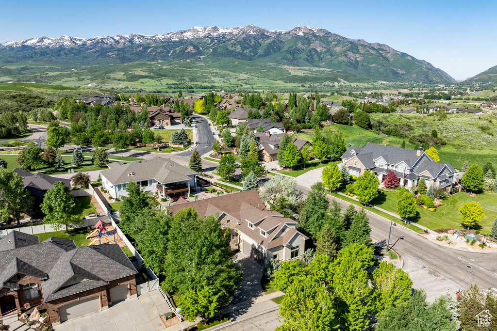 Aerial view of residential area with mountains