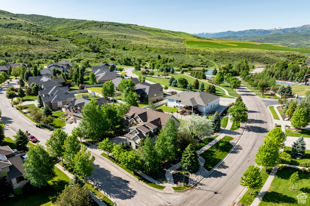 Aerial view of residential area featuring mountains