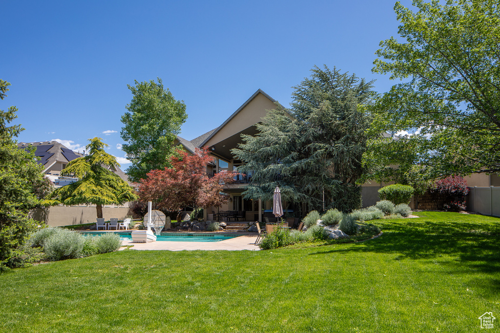 View of yard with a patio