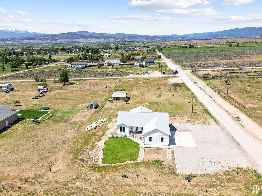 View of subject property with mountains