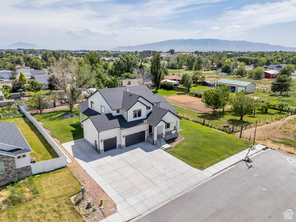 Aerial view of residential area featuring mountains