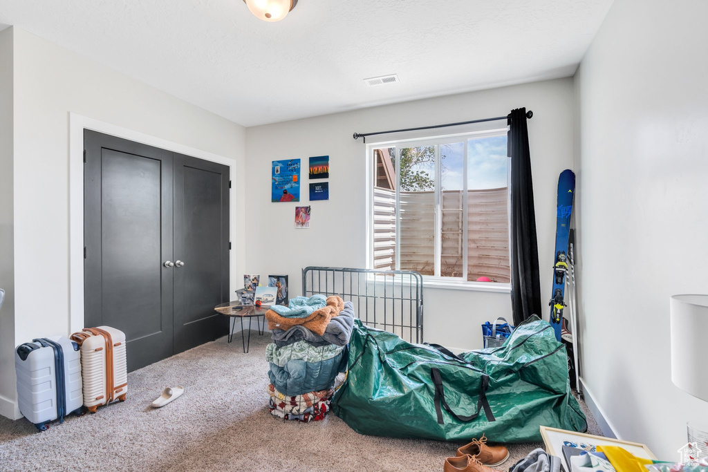View of carpeted bedroom
