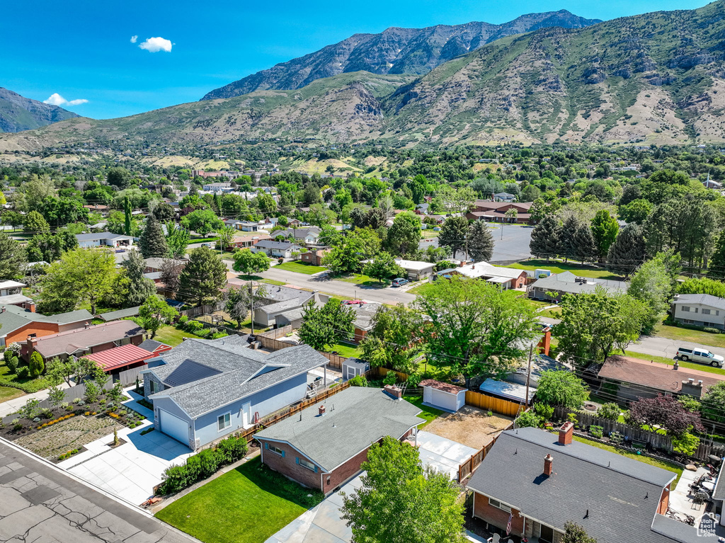 Aerial view of residential area featuring mountains