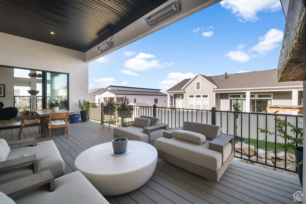Wooden deck with a residential view