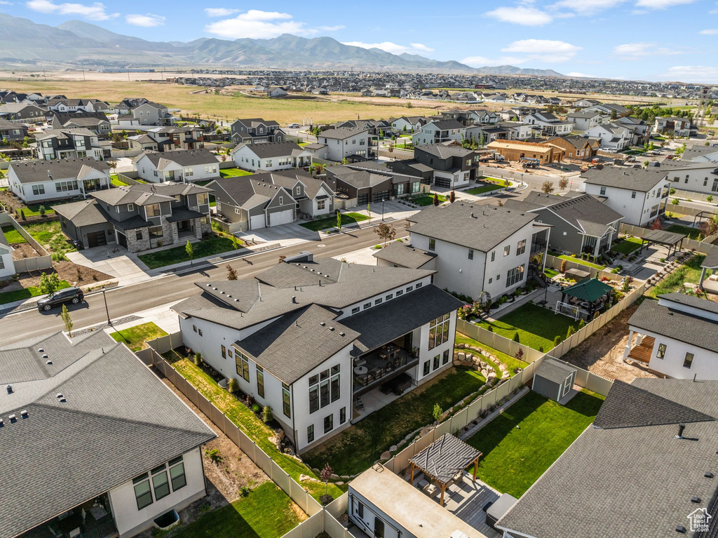 Aerial view of residential area with mountains