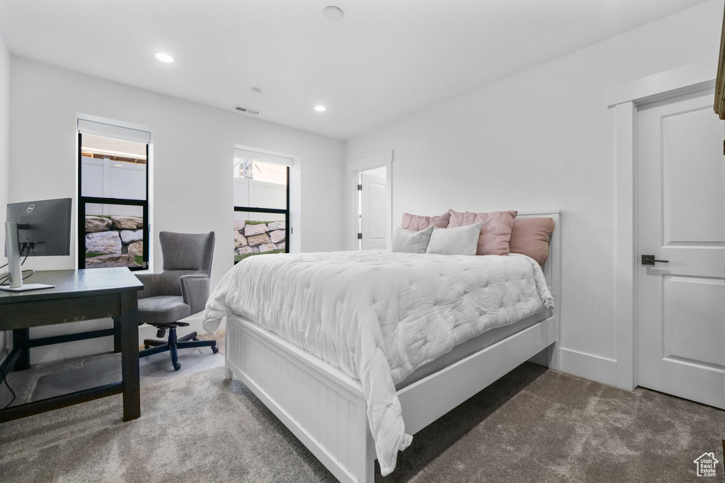 Bedroom featuring carpet floors, recessed lighting, and a desk
