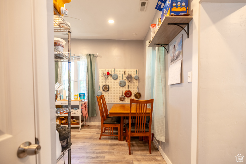Dining area featuring wood finished floors