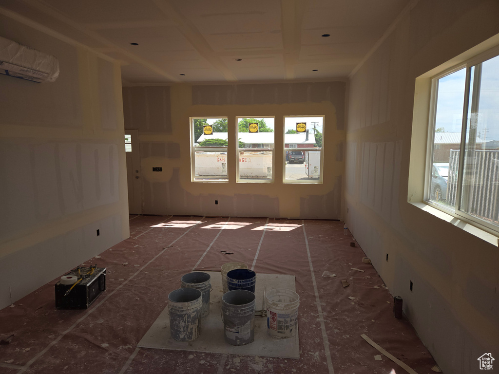 Spare room with a wall mounted AC