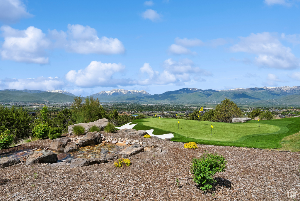 View of mountain background with a golf course