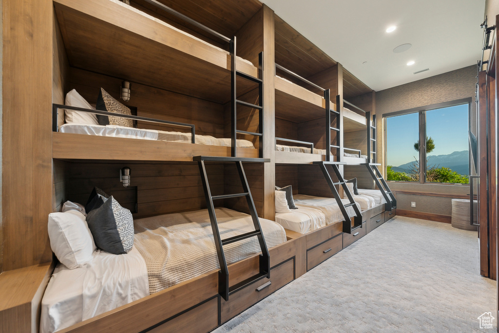 Carpeted bedroom featuring recessed lighting and baseboards