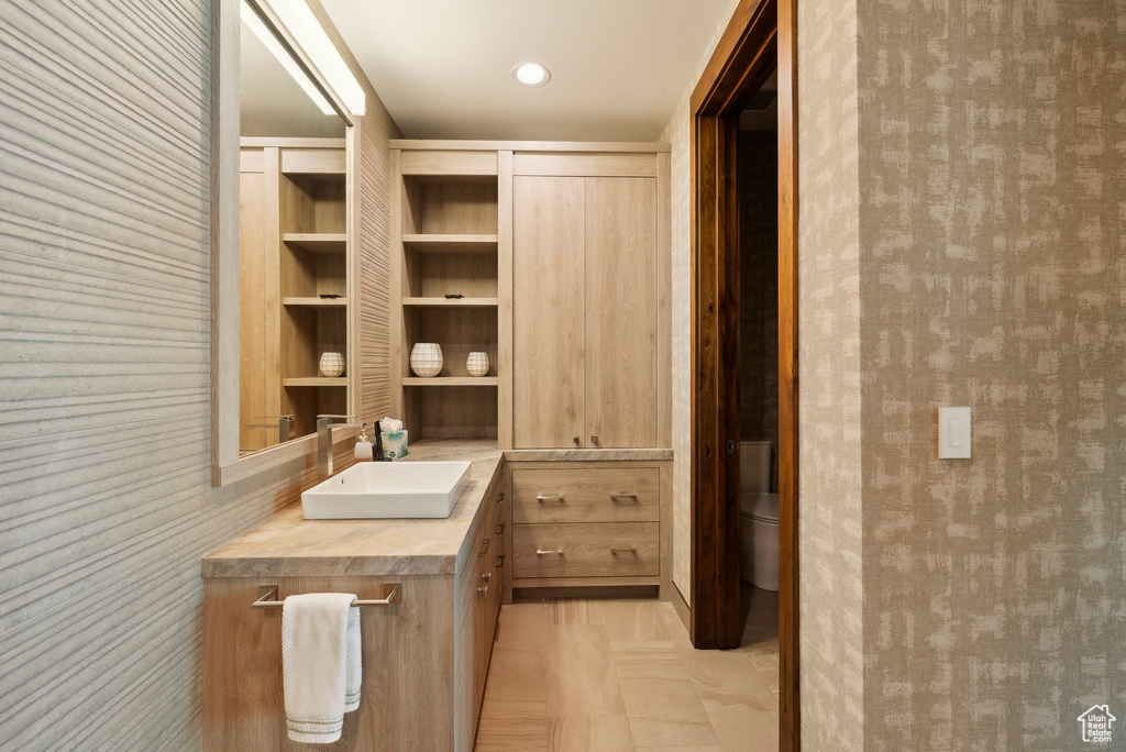 Bathroom with vanity and toilet