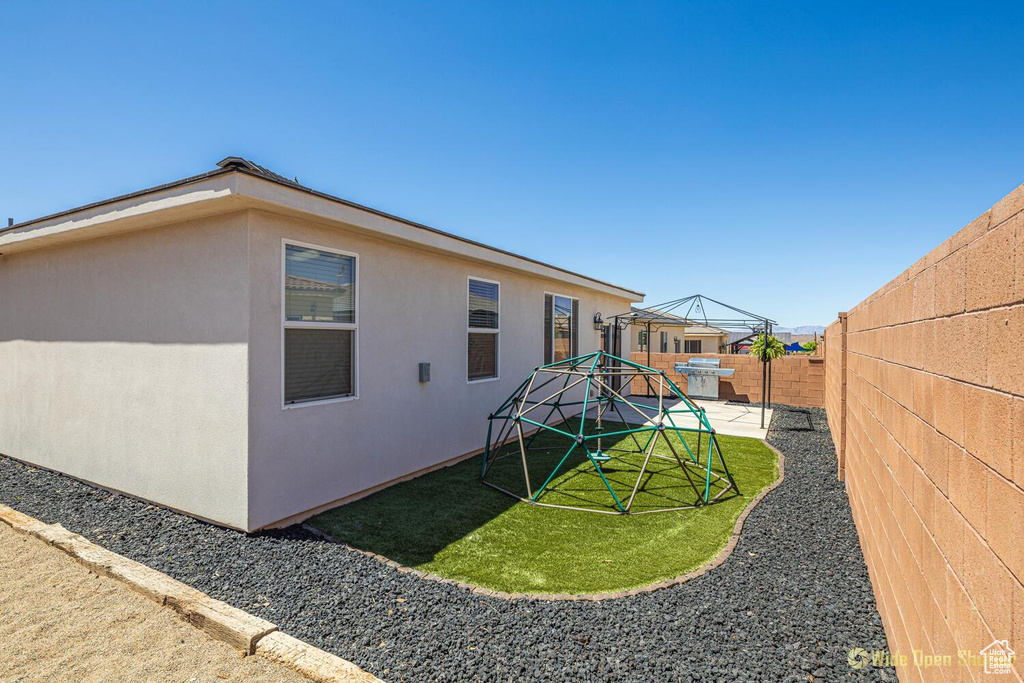 View of yard with a patio area and a gazebo