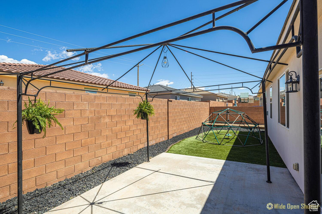 Fenced backyard featuring a patio area