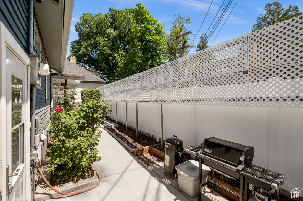 Fenced backyard with a patio area