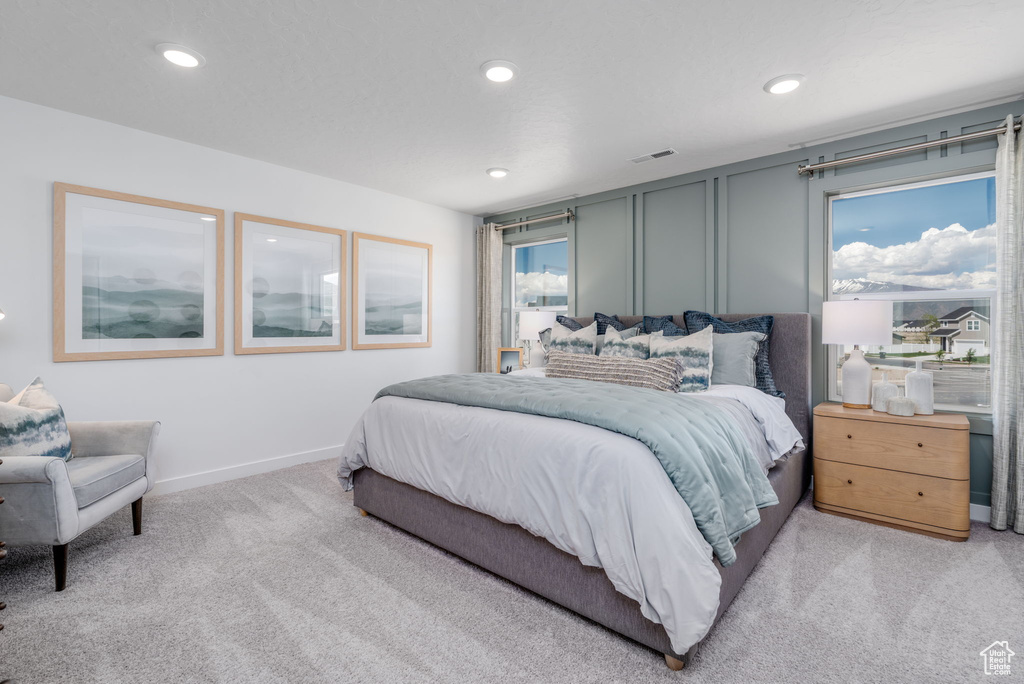 Bedroom with carpet flooring, recessed lighting, and baseboards