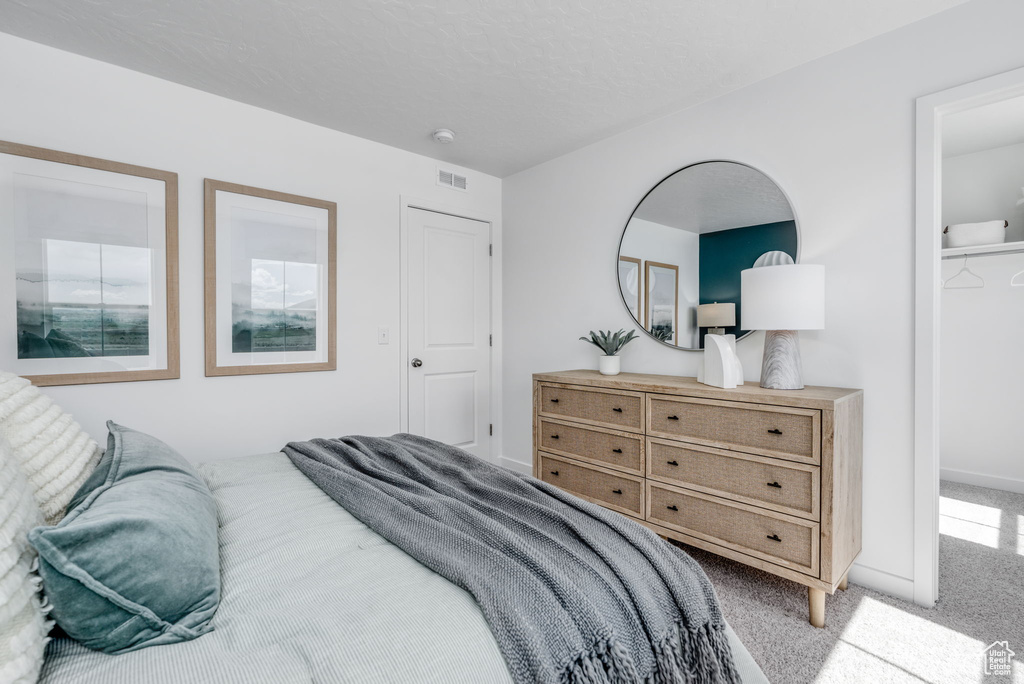 Bedroom with carpet