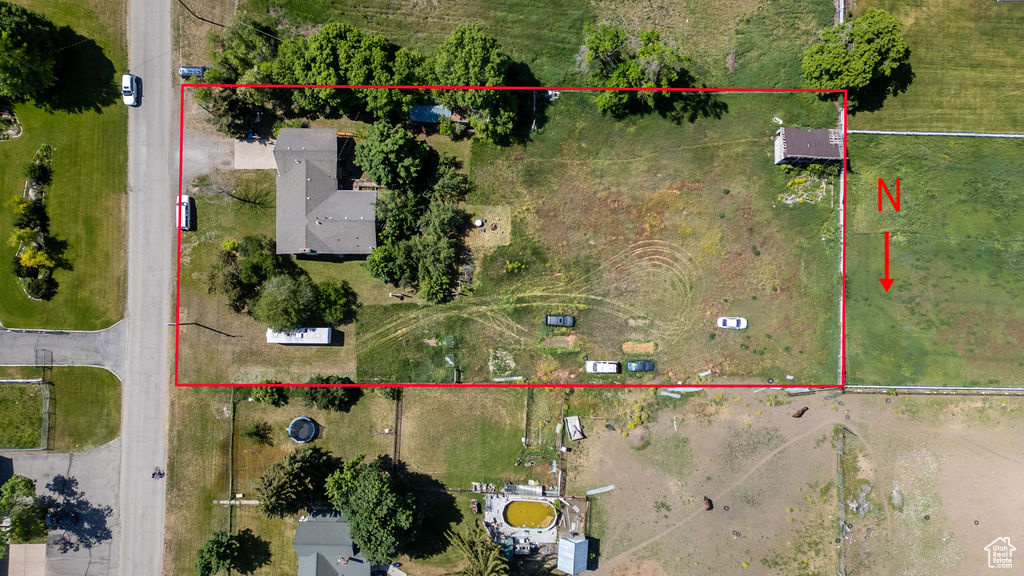 Aerial view of property\'s location with property parcel outlined