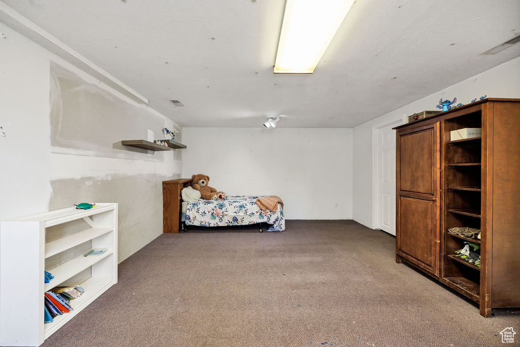 Bedroom featuring carpet flooring
