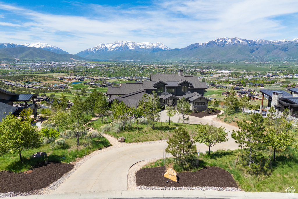 View of mountain background featuring nearby suburban area