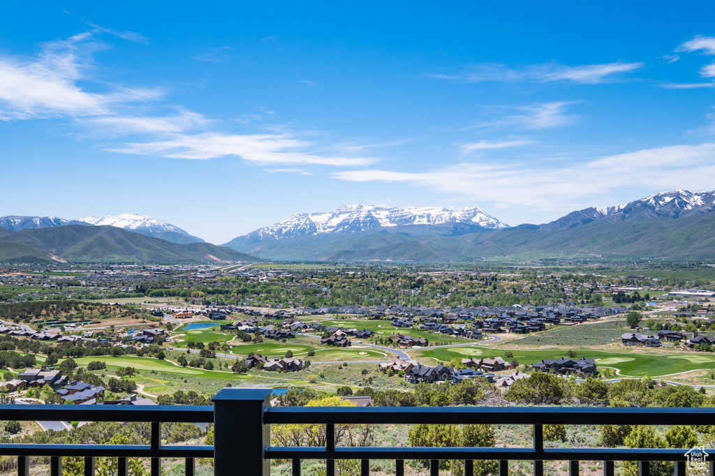 View of mountain backdrop with nearby suburban area and a local golf course
