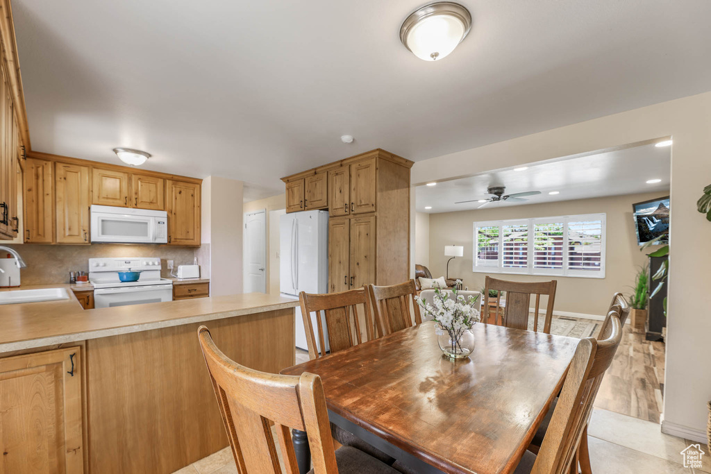 Dining area with ceiling fan