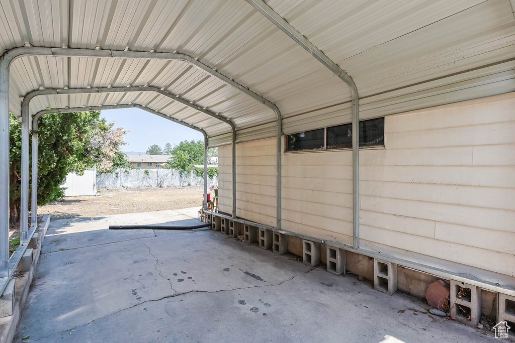 View of car parking with a detached carport