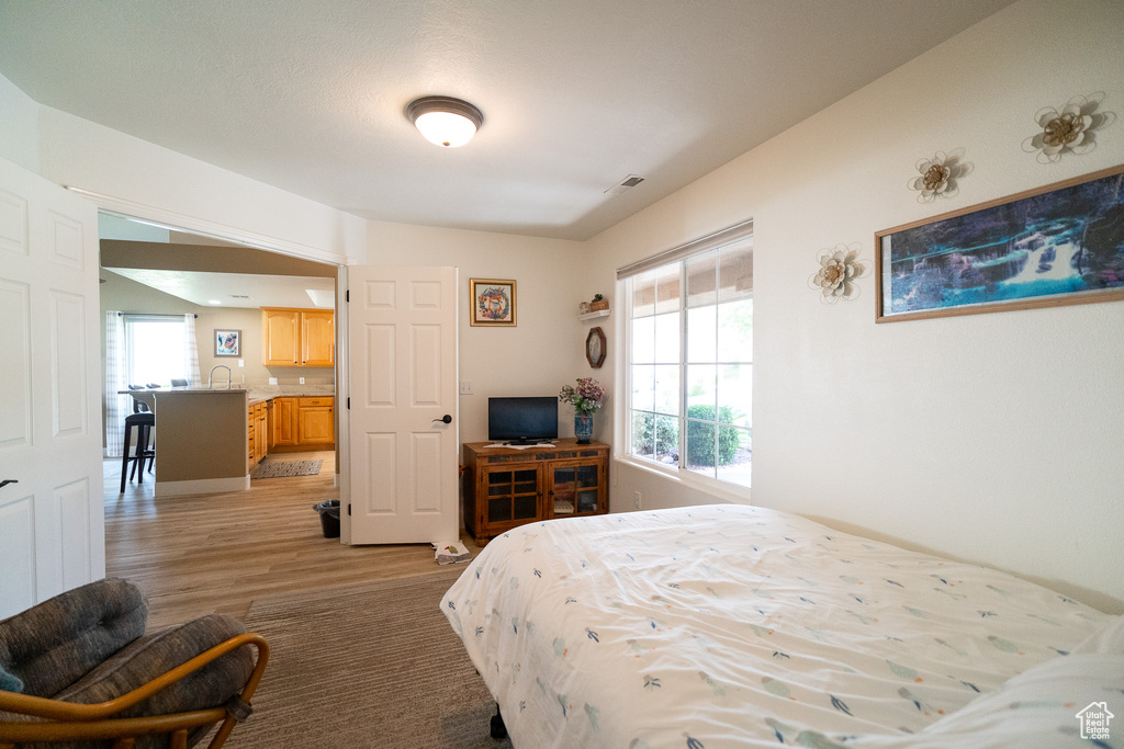 Bedroom featuring light wood-type flooring