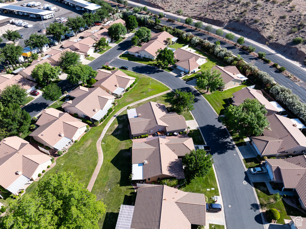 Aerial overview of property's location with nearby suburban area